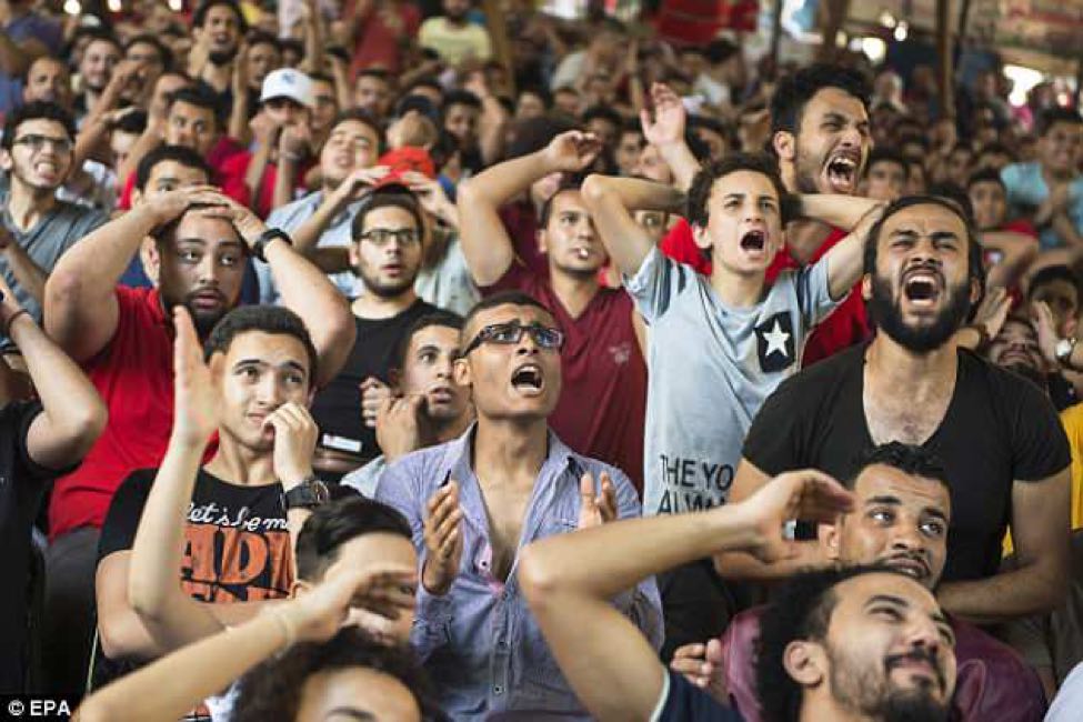 Photo credit: EPA Agency. Egyptian fans reacting to Uruguay’s  late winning goal